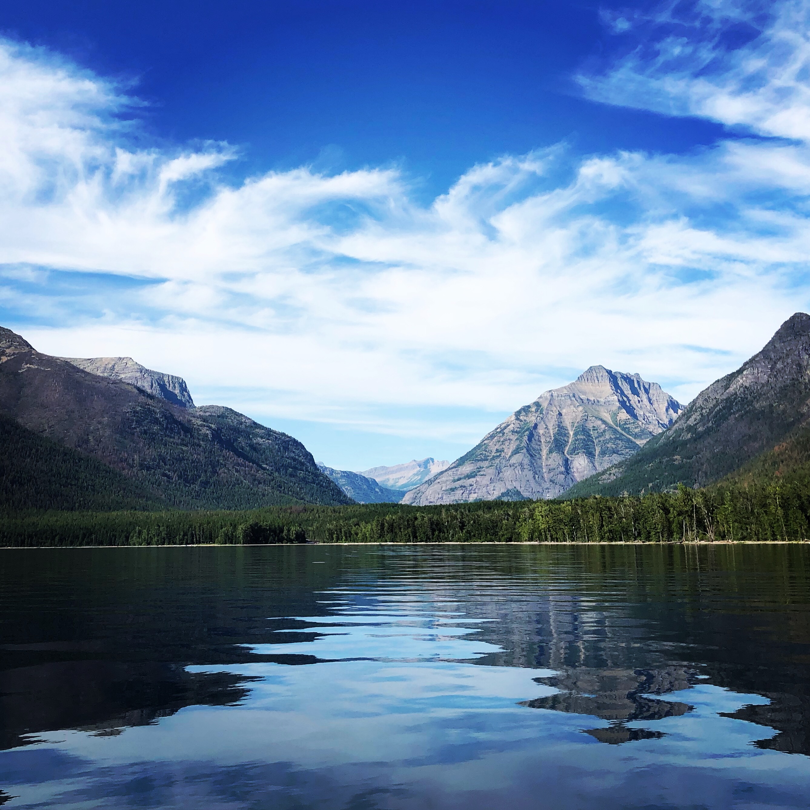 Serene mountain lake with perfect reflections - symbolizing grounded leadership, clarity, and mindful presence